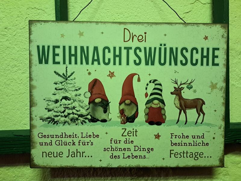 Schild mit drei Weihnachtswünschen